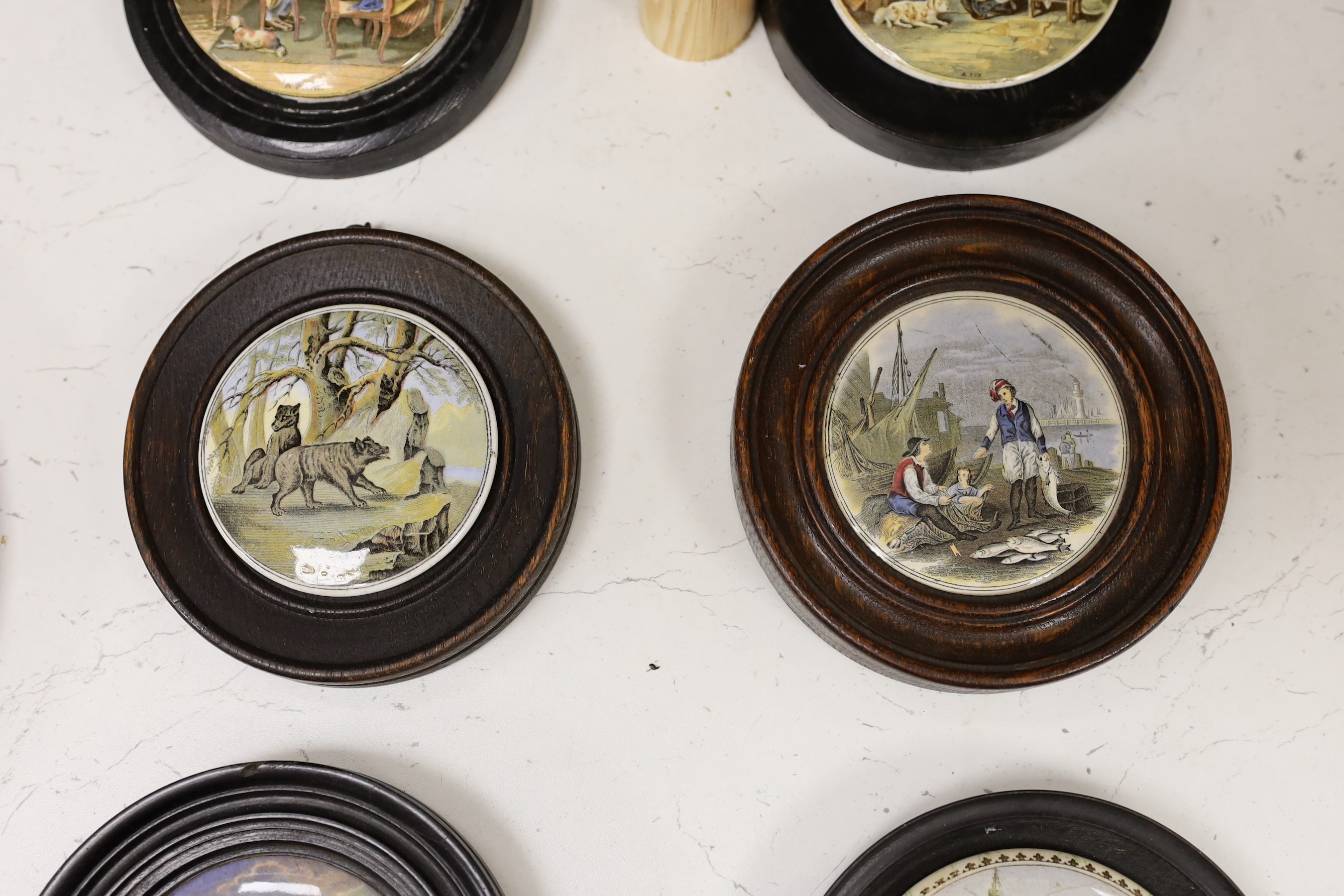 Ten 19th century framed ceramic pot lids